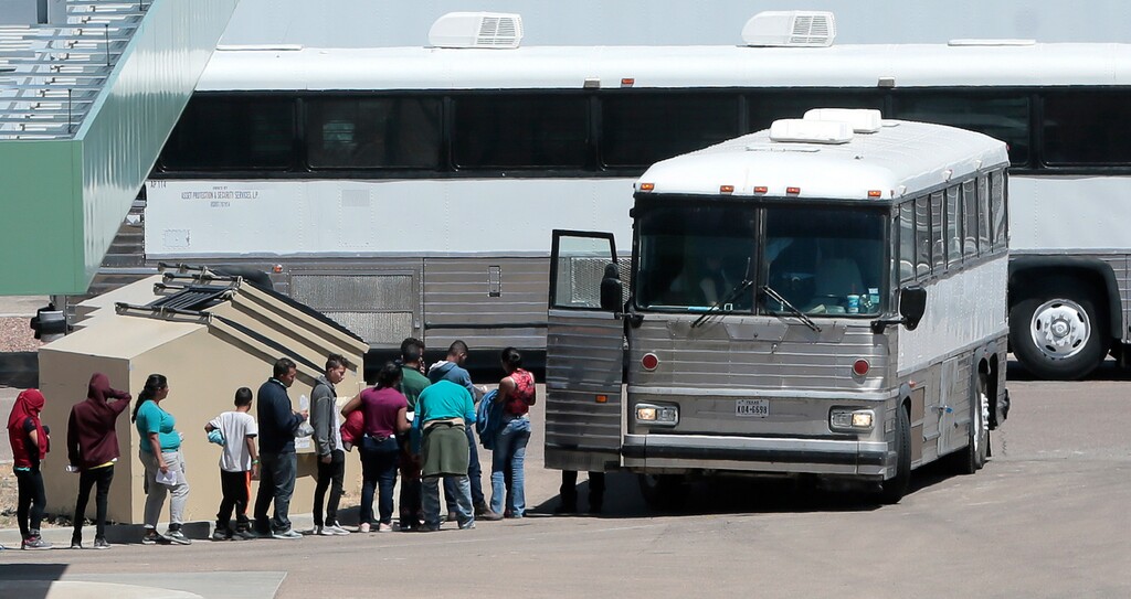 (Mark Lambie | The El Paso Times | AP file photo) In this April 20, 2019 file photo, migrants are loaded onto a bus at the Border Patrol headquarters on Hondo Pass, in El Paso, Texas. The U.S. Border Patrol's apprehensions of migrants at the border with Mexico hit their highest level in more than a decade, as officials warned they don't have the money and resources to care for the surge of parents and children entering the country. Agents made 132,887 apprehensions in May 2019, the first time that apprehensions have topped 100,000 since April 2007.