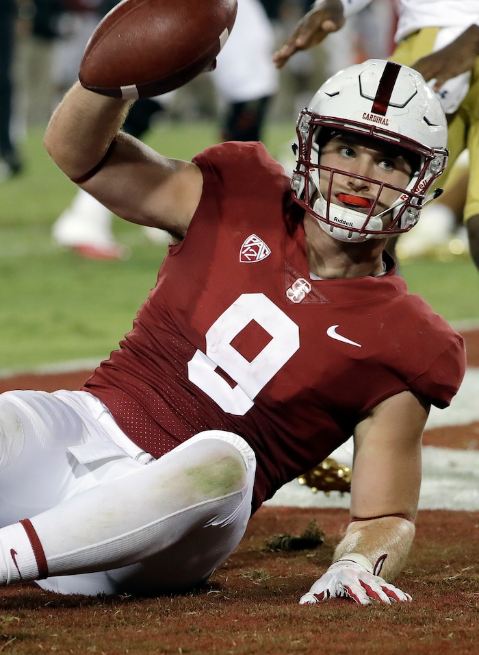 Stanford tight end Dalton Schultz (9) holds up the ball after making a touchdown catch against UCLA during the second half of an NCAA college football game Saturday, Sept. 23, 2017, in Stanford, Calif. (AP Photo/Marcio Jose Sanchez)
