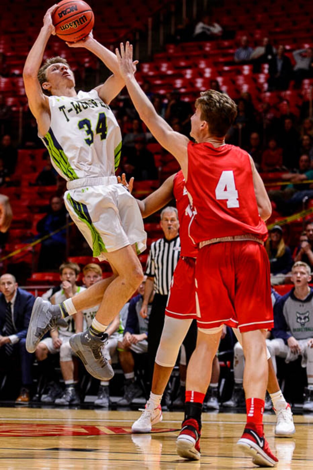 (Trent Nelson | The Salt Lake Tribune)  East vs. Timpanogos, 5A State high school basketball tournament at the Huntsman Center in Salt Lake City, Wednesday Feb. 28, 2018. Timpanogos's Derik Eaquinto (34) shoots over East's Taylor Zwick (4).