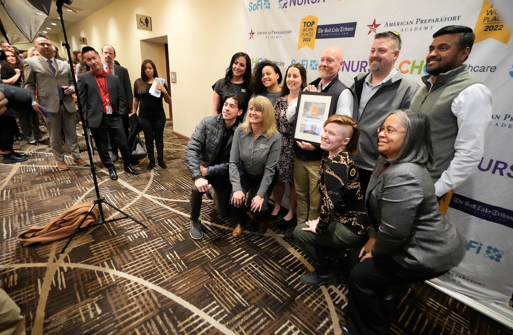 (Francisco Kjolseth | The Salt Lake Tribune) Award winners gather for group photos as The Salt Lake Tribune hosts Utah’s Top Workplaces in partnership with Energage for the ninth year running, presenting awards in downtown Salt Lake City celebrating the state’s best small, medium and large companies, on Wednesday, Oct. 26, 2022.
