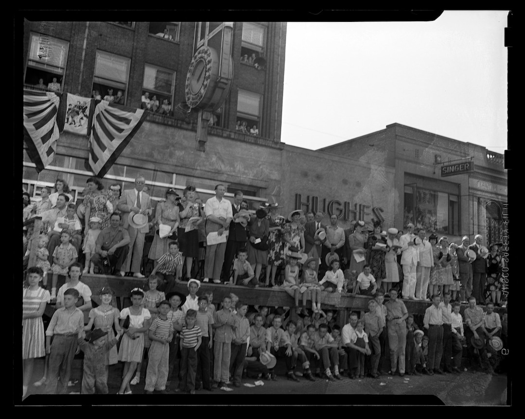 (Photo courtesy of Utah State History) Crowds line Salt Lake City's Main Street to watch the 1945 Pioneer Day parade — held in the waning days of World War II. The photo was originally taken by a Salt Lake Tribune staff photographer.