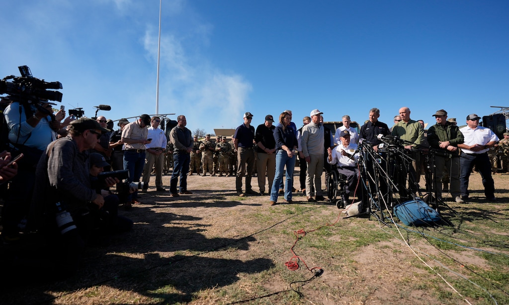 (Eric Gay | AP) Utah Gov. Spencer Cox, far left, stands behind Texas Gov. Greg Abbott, seated center, who is joined by fellow governors during a press conference along the Rio Grande to discuss Operation Lone Star and border concerns, Sunday, Feb. 4, 2024, in Eagle Pass, Texas.