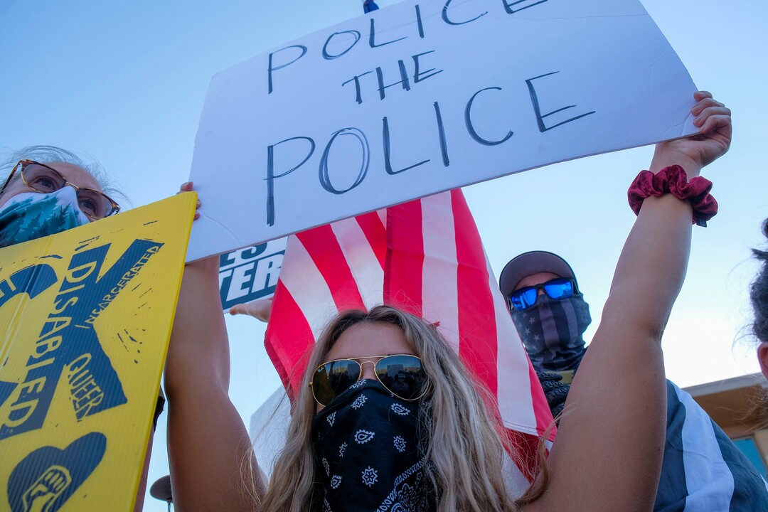 (Leah Hogsten  |  The Salt Lake Tribune) Supporters for Black Lives Matter mix with Blue Lives Matter supporters. Five days after after nine protesters were arrested during a peaceful rally in memory of Zane James that turned into a violent clash with Cottonwood Heights officers, demonstrators gathered outside the police station Friday to denounce CHPD's actions and its officers for inciting the violence.