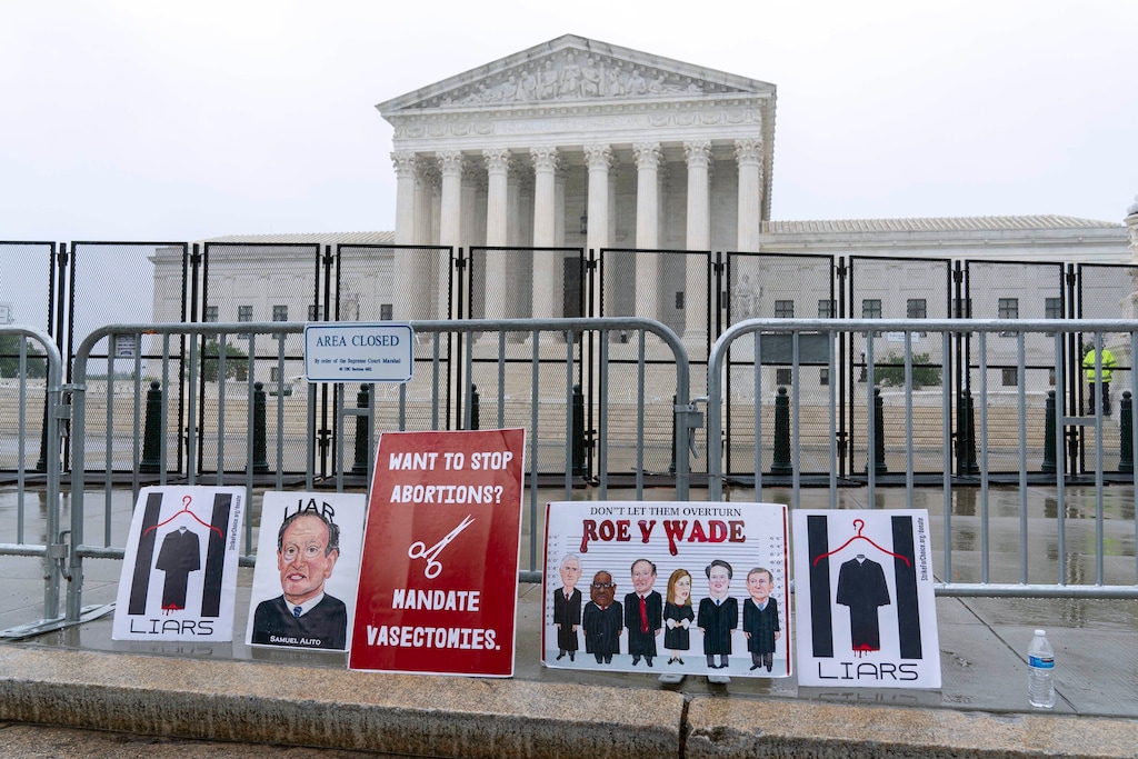 (Jose Luis Magana | AP) Signs placed at the fence outside of the U.S. Supreme Court on Capitol Hill in Washington, Thursday, June 23, 2022.