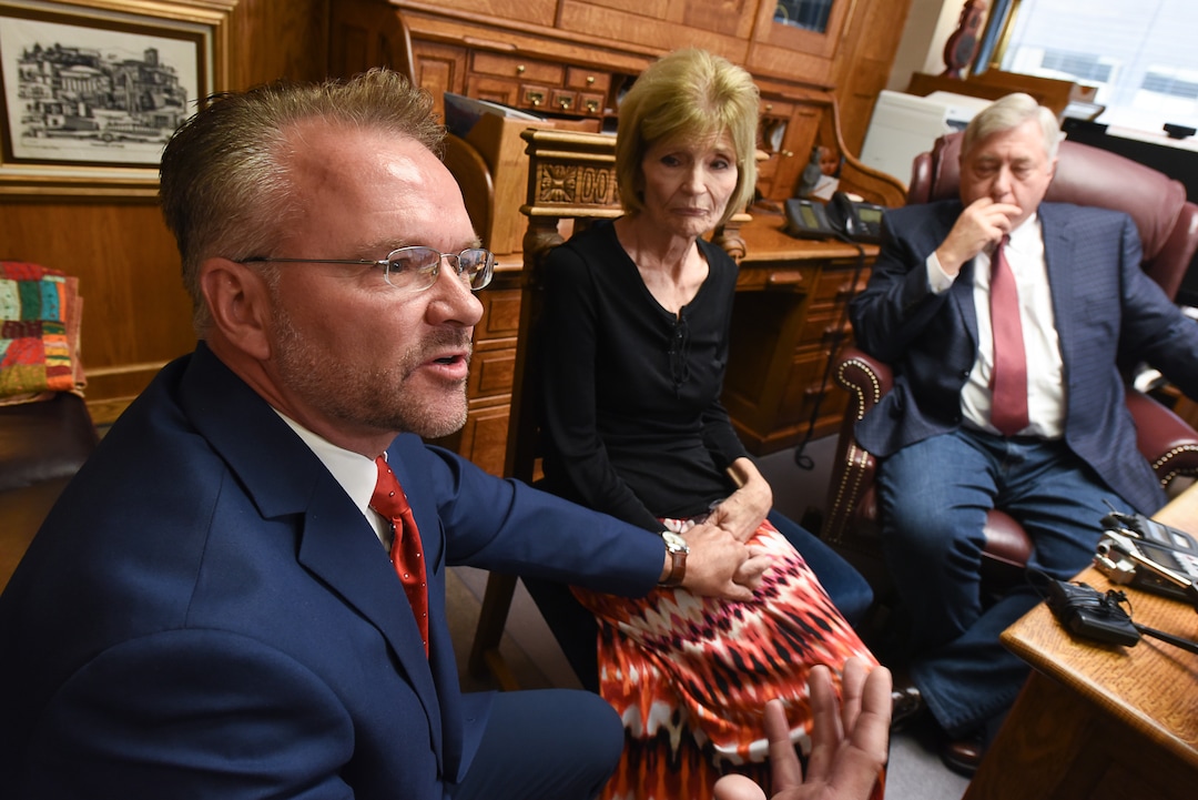 (Francisco Kjolseth  |  The Salt Lake Tribune)  Grant Stanfield and his mother Connie Elison, left, brother and mother of Thomas Stanfield who was shot and killed by a Citadel security guard last week, speak with the press at the office of their attorney, Robert Sykes, at right, in Salt Lake City on Tuesday, June 26, 2018, after filing a civil rights and wrongful death law suit.