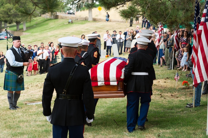 (Alex Gallivan  |  Special to The Tribune) Marine Pfc. Robert K. Holmes, who died 77 years ago aboard the USS Oklahoma during the attack on Pearl Harbor, is laid to rest in the Salt Lake City Cemetery, Monday, Aug. 20, 2018.