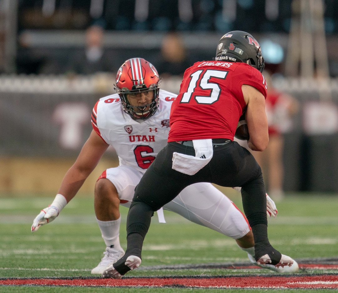 Utah Utes defensive end Bradlee Anae (6) applies pressure on NIU quarterback Marcus Childers (15) during a college football game at Huskie Stadium in DeKalb, IL on Saturday, Sept. 08, 2018 (Sean King | for The Salt Lake Tribune)