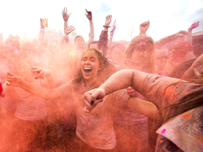 (Rick Egan  |  The Salt Lake Tribune)       Revelers dance to the sounds of Aakansha Bollypop, during the 22nd annual Holi Festival of Colors at the Sri Sri Radha Krishna Temple in Spanish Fork, Saturday, March 24, 2018. The festival which celebrates the beginning or spring is also known as at the Festival of Love.