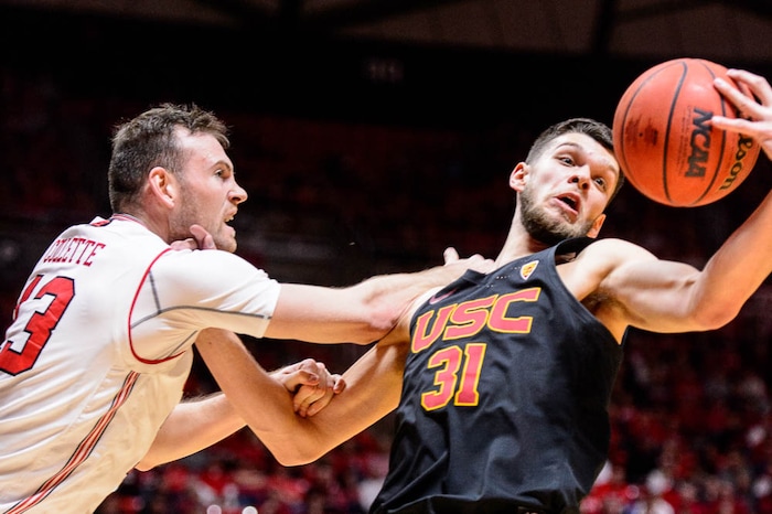(Trent Nelson | The Salt Lake Tribune)  Utah Utes forward David Collette (13) and USC Trojans forward Nick Rakocevic (31) as the University of Utah hosts USC, NCAA basketball at the Huntsman Center in Salt Lake City, Saturday Feb. 24, 2018.