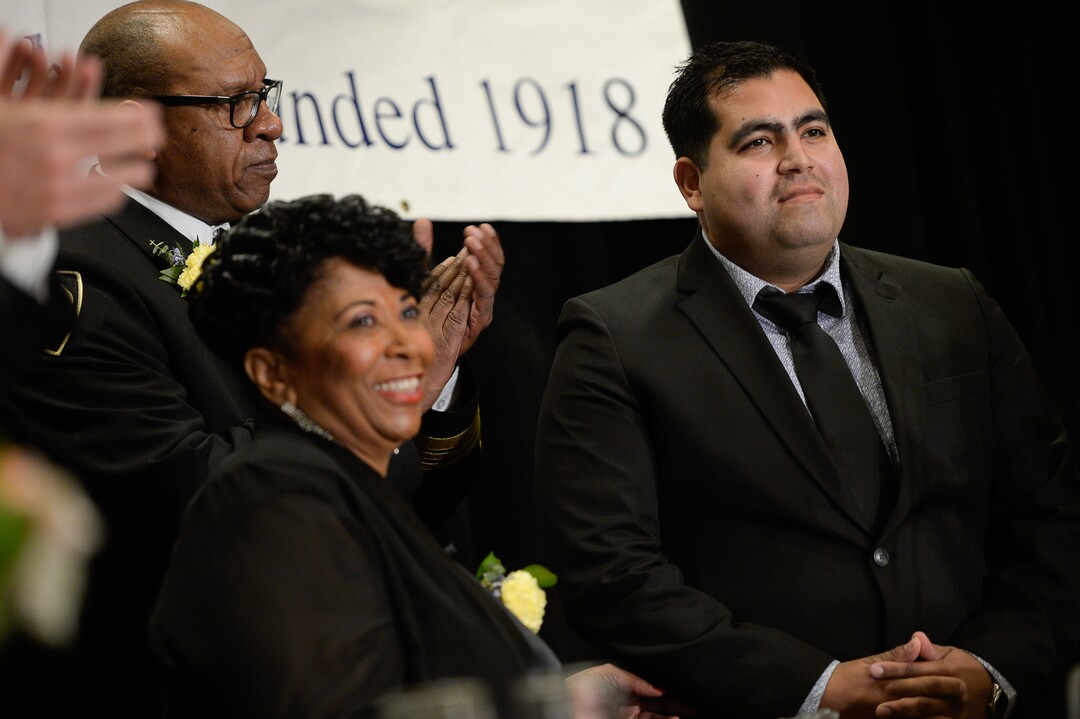 (Francisco Kjolseth  |  The Salt Lake Tribune) Trooper Ruben Correa of the Utah Highway Patrol is presented with a First Responder Award by Battalion Chief Jeffrey Thomas and Jeanetta Williams, President of the NAACP Salt Lake Chapter during the Dr. Martin Luther King Jr. Memorial Luncheon at Little America Hotel on Monday, Jan. 20, 2020. Trooper Correa conducted a traffic stop on Oct. 19, 2019, where he pulled an unconscious driver from a vehicle moments before it was struck by a Frontrunner train.