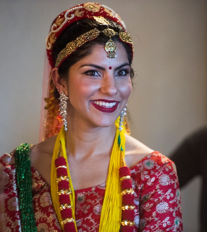 (Rick Egan  |  The Salt Lake Tribune)   Anju Sharma prepares to walk the runway in her outfit from Nepal, at the 8th Annual Women of the World Fashion Show. The fashion show fund is raiser for the non-profit that seeks to help refugees settle in a new culture. Wednesday, March 7, 2018.