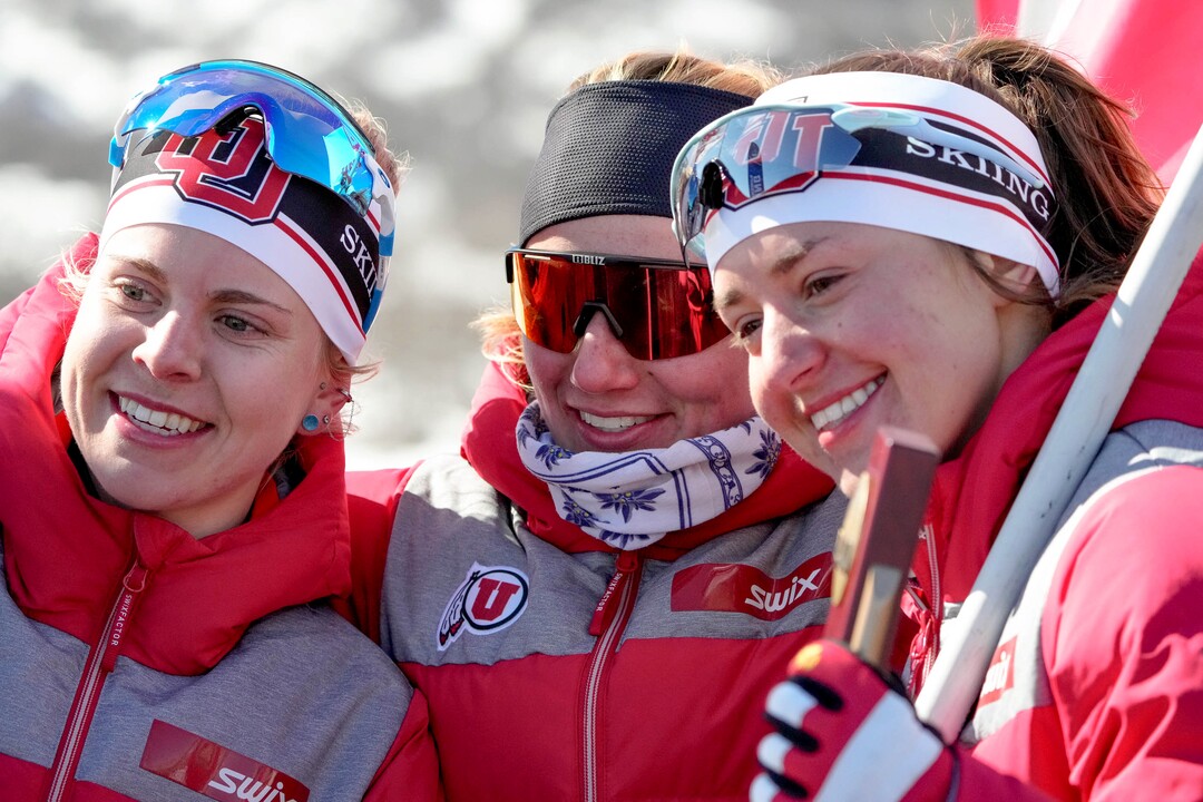 (Francisco Kjolseth | The Salt Lake Tribune) Sophia Laukli, Novie McCabe and Sydney Palmer-Ledger, from left, of the University of Utah celebrate after competing in the women’s 5K classic in the NCAA Skiing Championships held at the Soldier Hollow Nordic Center on Thursday, March 10, 2022 in Midway, Utah.