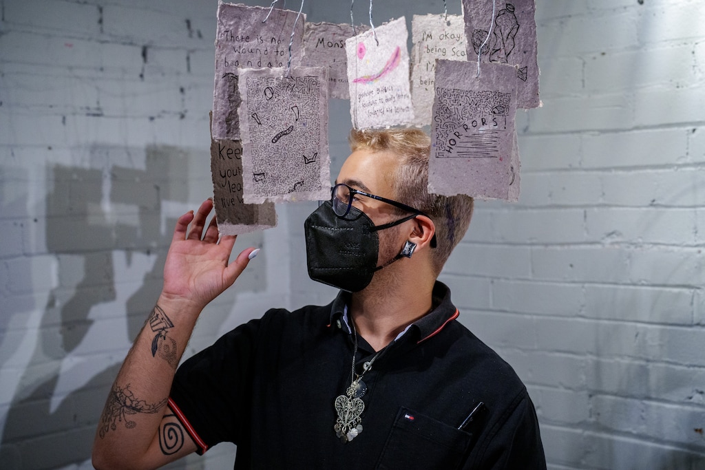 (Trent Nelson  |  The Salt Lake Tribune) Lewis Figun Westbrook with "Restless Night" at the opening of their "Monstrous: Being the Monstrous Other" exhibit at Arts Access Utah in Salt Lake City on Friday, Aug. 16, 2024.
