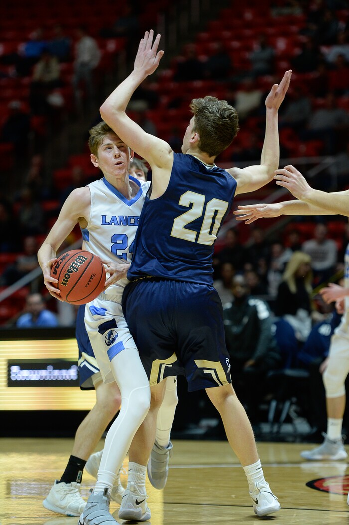 (Francisco Kjolseth  |  The Salt Lake Tribune)  Westlake vs Layton, 6A State high school basketball tournament at the Huntsman Center in Salt Lake City, Thursday March 1, 2018. Chase Potter (24) tries to push past Cooper Mattson (20). 