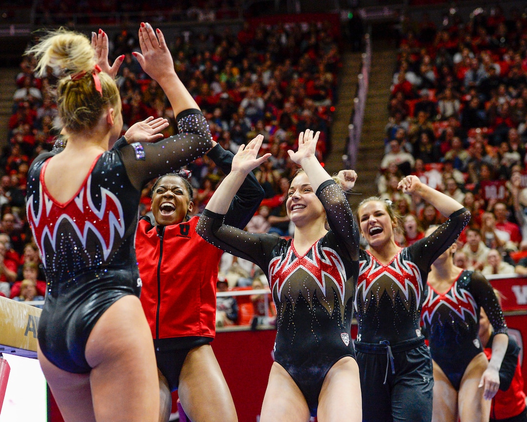 (Leah Hogsten  |  The Salt Lake Tribune) Abby Paulson is congratulated after her routine on the beam as the University of Utah fifth-ranked gymnastics team hosts No. 12 University of Kentucky during its home opener, Jan. 3, 2020, at the Huntsman Center. Paulson scored a 9.95.