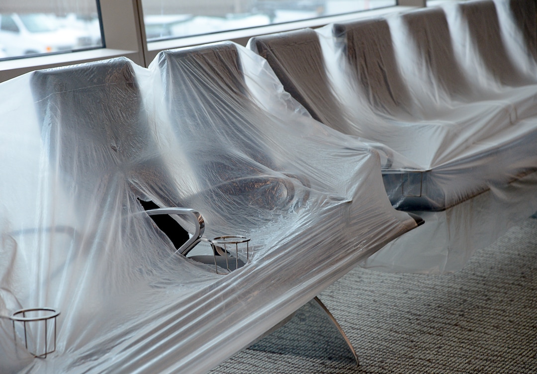 (Francisco Kjolseth  |  The Salt Lake Tribune) Chairs remain covered with plastic as crews continue their work in the first phase of construction of the Salt Lake City International Airport on Wednesday, May 20, 2020.