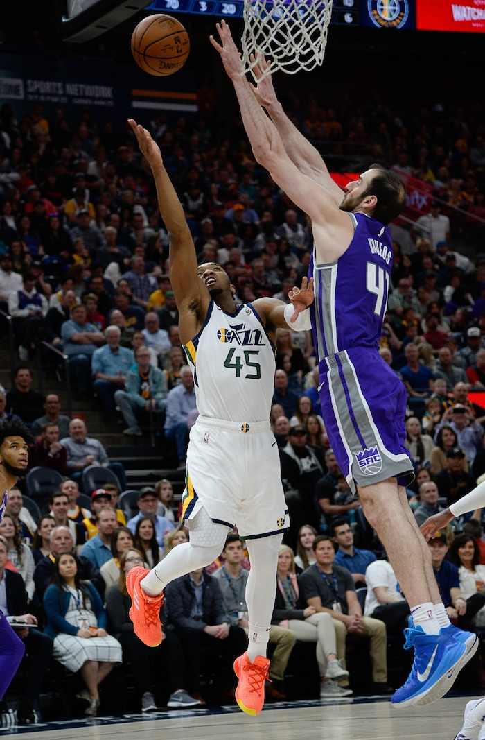 (Francisco Kjolseth  |  The Salt Lake Tribune)  Utah Jazz guard Donovan Mitchell (45) is blocked by Sacramento Kings center Kosta Koufos (41) as the Utah Jazz host the Sacramento Kings in their NBA game at Vivint Smart Home Arena Friday, April 5, 2019, in Salt Lake City.