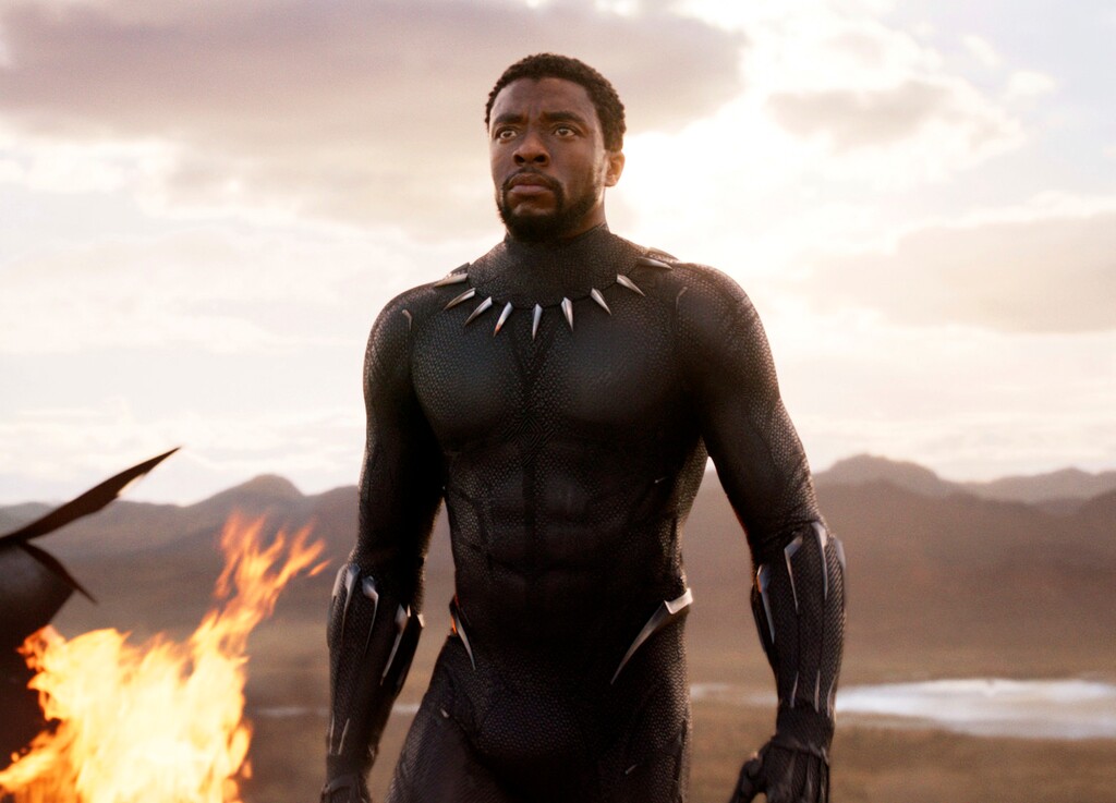 FILE - This file image released by Disney and Marvel Studios' shows Chadwick Boseman in a scene from "Black Panther." “Black Panther” has become the first film since 2000’s “Avatar” to top the weekend box office five straight weekends. According to studio estimates Sunday, March 18, 2018, “Black Panther” grossed $27 million in ticket sales over the weekend, pushing its domestic haul to $605.4 million. (Marvel Studios/Disney via AP, File)