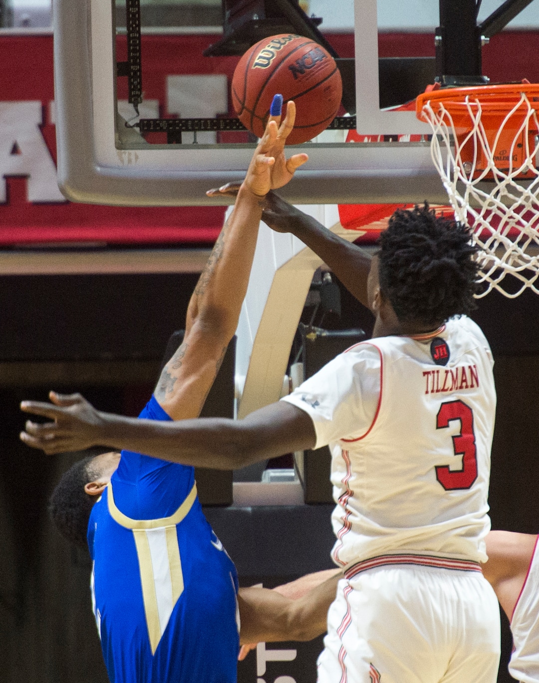 (Rick Egan  |  The Salt Lake Tribune)      Utah Utes forward Donnie Tillman (3) blocks a shot by Tulsa Golden Hurricane guard DaQuan Jeffries (2), in basketball action between, Utah Utes and Tulsa Golden Hurricane, at the Jon M. Huntsman Center, Saturday, Dec. 1, 2018.