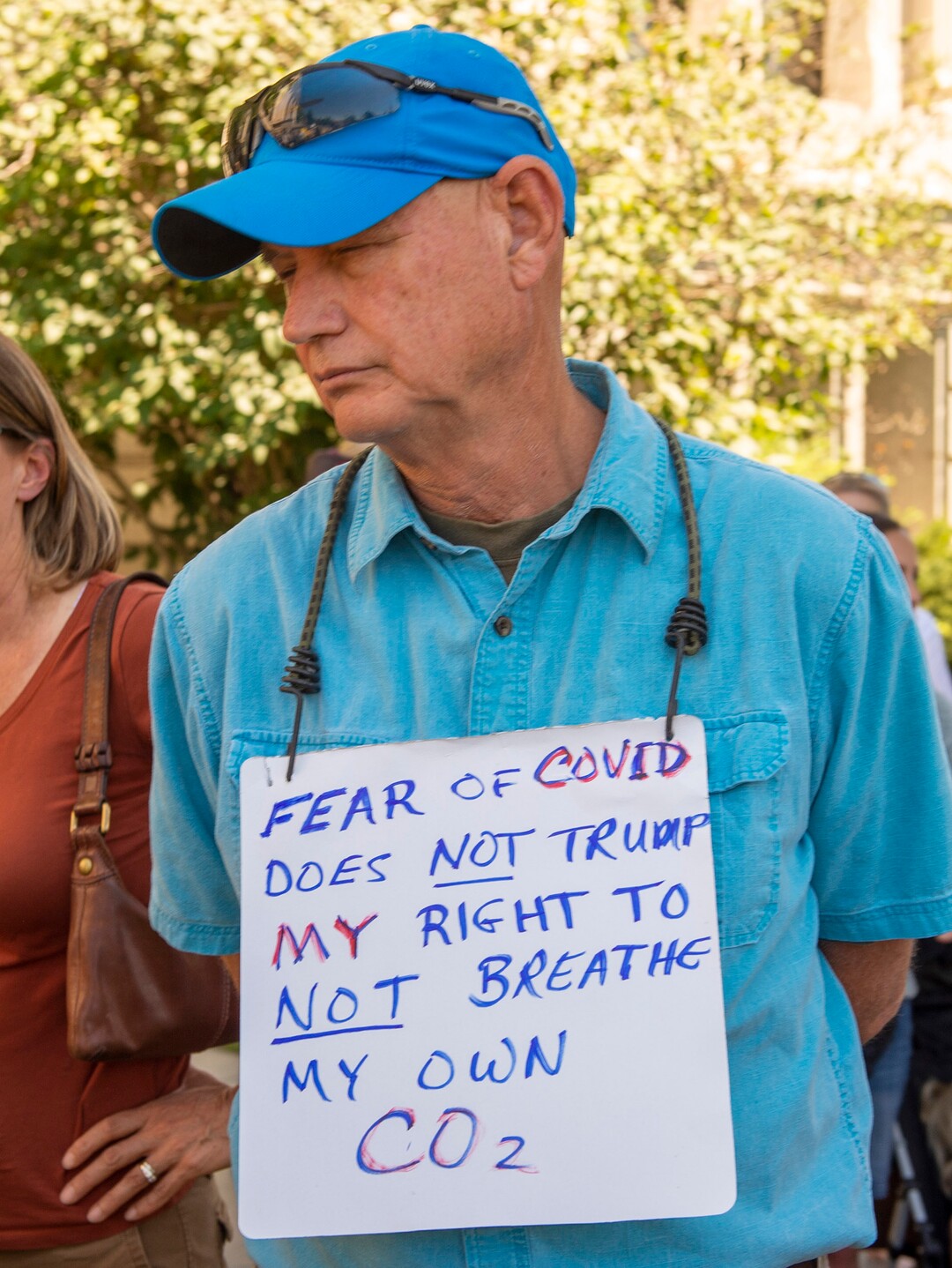 (Rick Egan  |  The Salt Lake Tribune)   Residents gather for a rally protesting against masks being required in schools, before the Utah County Commission meeting in Provo, on Wednesday, July 15, 2020.