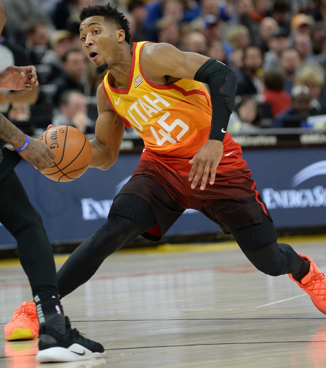 (Francisco Kjolseth  |  The Salt Lake Tribune)  Utah Jazz guard Donovan Mitchell (45) maneuvers around the Pistons defense in the first half of their NBA game at Vivint Smart Home Arena Monday, Jan. 14, 2019, in Salt Lake City.