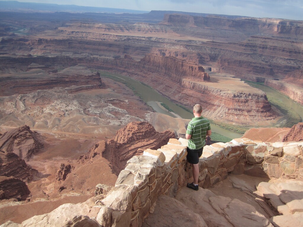 (Tom Wharton  |  Tribune file photo) A tourist enjoys the view from Dead Horse Point State Park near Moab.