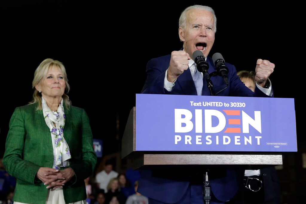 (Marcio Jose Sanchez | AP file photo) Democratic presidential candidate former Vice President Joe Biden, accompanied by his wife Jill, gestures as he speaks during a primary election night rally Tuesday, March 3, 2020, in Los Angeles.
