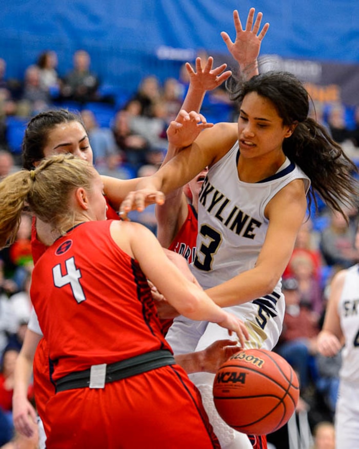 (Trent Nelson | The Salt Lake Tribune)  Springville's Brooke lynn Galbraith (4) strips the ball from Skyline's Kiana Eskelson (3) as Skyline faces Springville in the 5A High School Girls' Basketball Tournament at SLCC in Taylorsville, Wednesday Feb. 21, 2018.