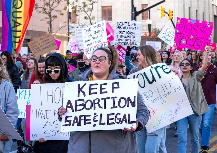 (Rick Egan | The Salt Lake Tribune) Hundreds of protesters march down State Street after a bans off our bodies protest hosted by Planned Parenthood, on Tuesday, May 3, 2022.
