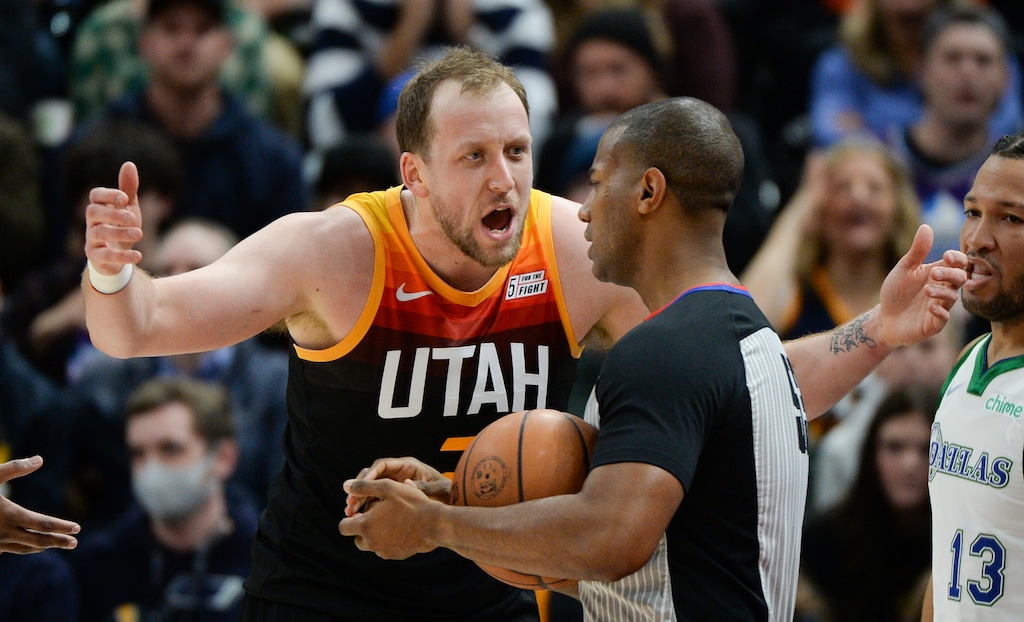 (Chris Samuels | The Salt Lake Tribune) Guard Joe Ingles, left, argues a call with referee John Butler as the Utah Jazz play the Dallas Mavericks at Vivint Arena Saturday, Dec. 25, 2021.