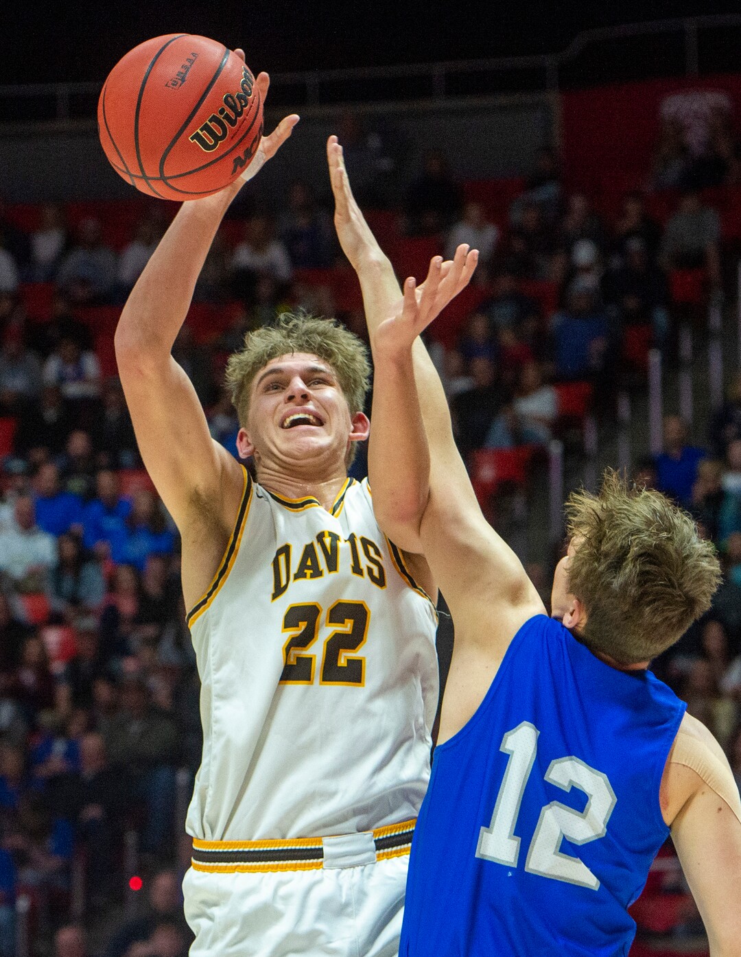 (Rick Egan  |  The Salt Lake Tribune)    Davis High forward Jax Pearce (22) shoots as Fremont Silverwolves Mitch Stratford (12) defends, in the 6A championship game at the Jon M. Huntsman Center, Saturday Feb. 29, 2020