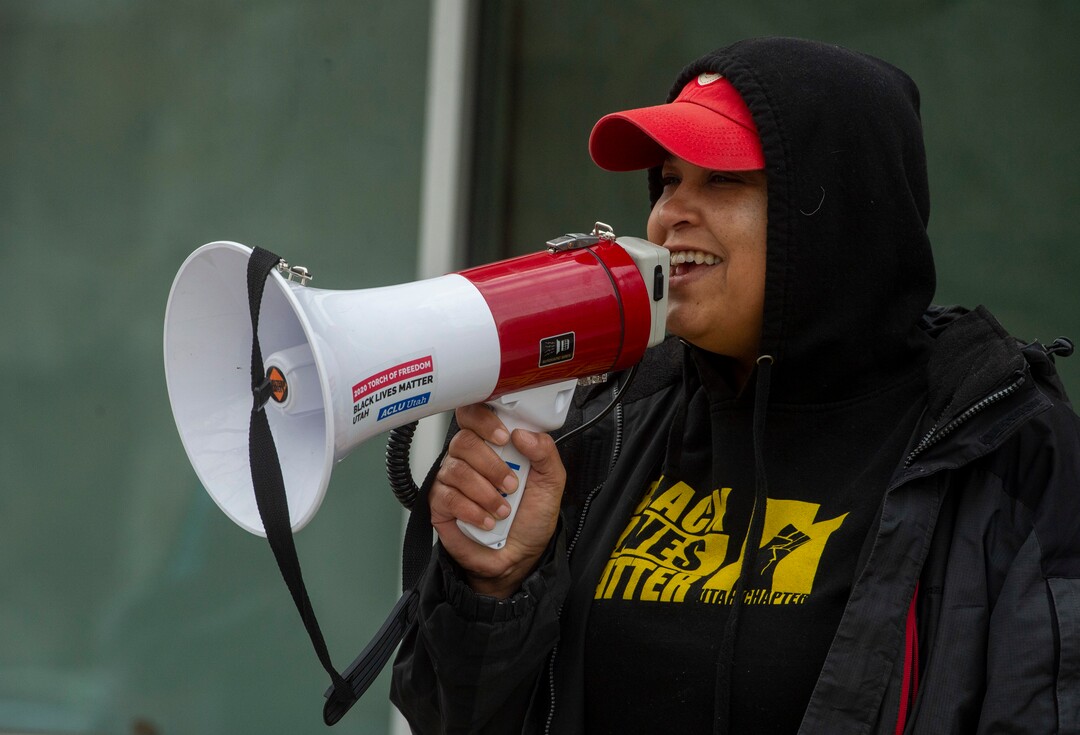 (Rick Egan | The Salt Lake Tribune) Lex Scott, the leader of Black Lives Matter Utah, joins a group of more than 100 homeless advocates to protest the way the health department has been forcing people experiencing homelessness to move in the middle of a pandemic and the coldest time of the year, in front of the Salt Lake Public Health Center on Friday, Dec. 18, 2020.