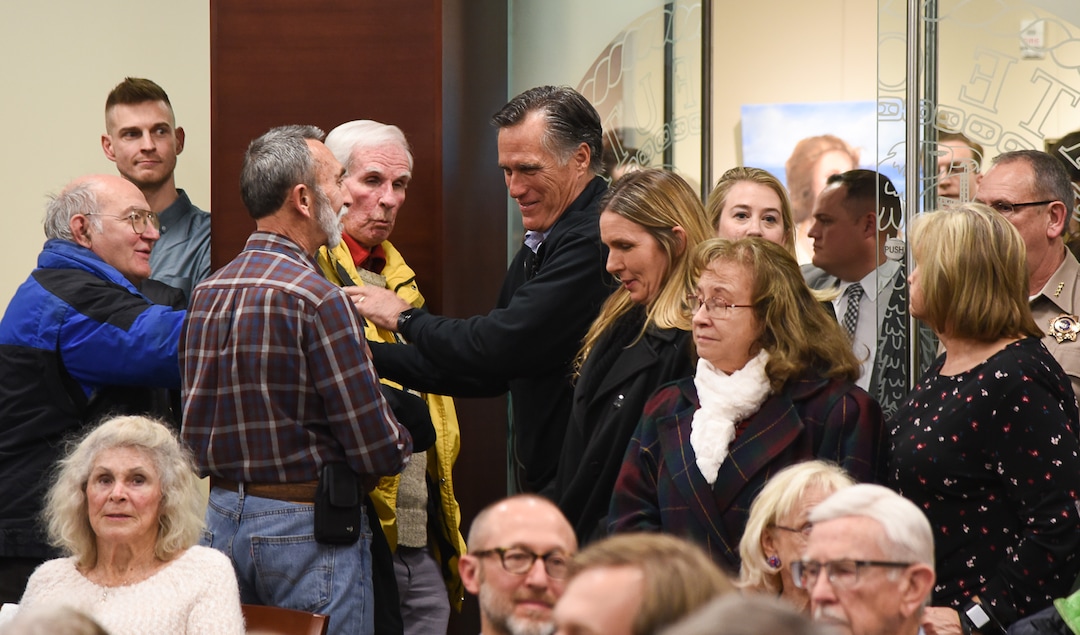 (Francisco Kjolseth  |  The Salt Lake Tribune)  U.S. Senator Mitt Romney arrives for his town hall meeting at the Davis County administration building, Tuesday, January 22, 2019, to hear from local residents.