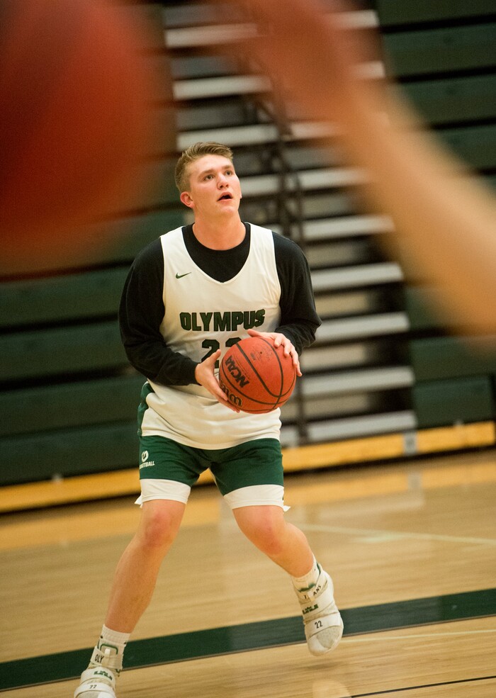 (Rick Egan  |  The Salt Lake Tribune)    Spencer Jones (22), one of Olympus boys' basketball team's two big men, runs drills during basketball practice, Monday, January 8, 2018.