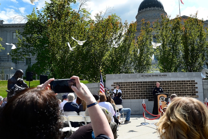 (Scott Sommerdorf | The Salt Lake Tribune)
Doves are released at the Utah Law Enforcement Memorial to honor the 142 police officers killed in the line of duty to the state of Utah, Thursday, May 3, 2018.
No Utah law enforcement officer died in the line of duty last year.