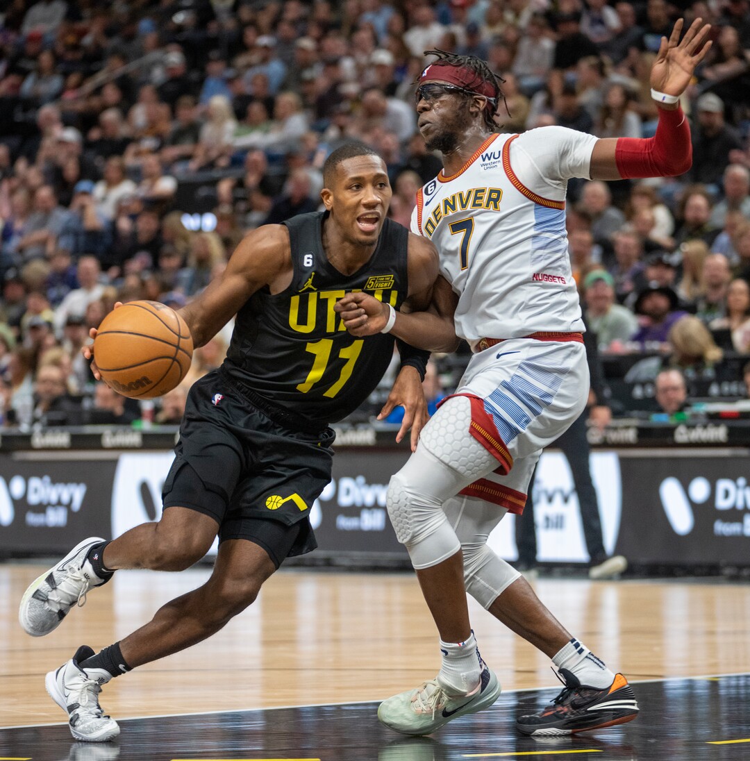 (Rick Egan | The Salt Lake Tribune) in Utah Jazz guard Kris Dunn (11) gets past Denver Nuggets guard Reggie Jackson (7), in NBA action between the Utah Jazz and the Denver Nuggets at Vivint Arena,  Saturday, April 8, 2023.