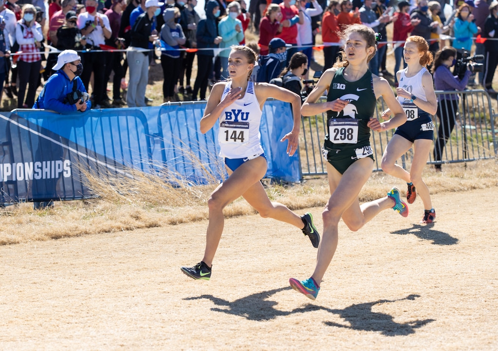 (Jaren Wilkey | BYU) Aubrey Frentheway, left, competes in the NCAA cross country national championships March 15, 2021 in Stillwater, Okla.