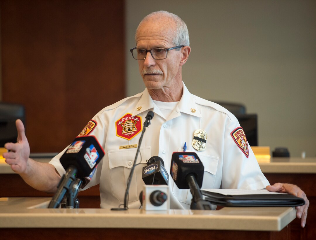 (Rick Egan  |  The Salt Lake Tribune)         Assistant Chief Mike Watson speaks at a news conference at Draper City Hall about Matt Burchett, 42, who died fighting wildfires in California. Tuesday, Aug. 14, 2018.