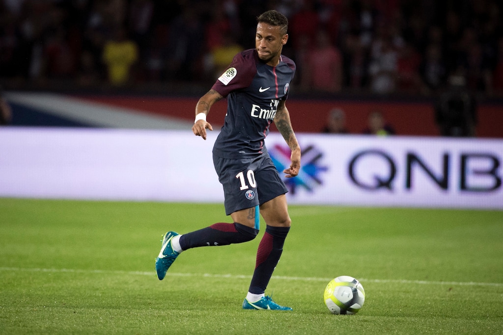 FILE - In this file photo dated Friday, Aug. 25, 2017, PSG's Neymar during the French League One soccer match between Paris Saint Germain and Saint Etienne at the Parc des Princes stadium in Paris, France. The French capital club PSG broke the world record fee to sign Neymar from Barcelona for 222 million euros ($262 million).  (AP Photo/Kamil Zihnioglu, FILE)