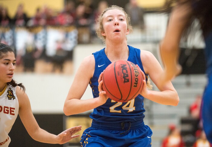 (Rick Egan  |  The Salt Lake Tribune)   San Juan guard Madi Palmer (24) makes a pass, in 3A Women's basketball State playoff action Judge Memorial Vs. San Juan, in Heber City, Friday, Feb. 16, 2018.