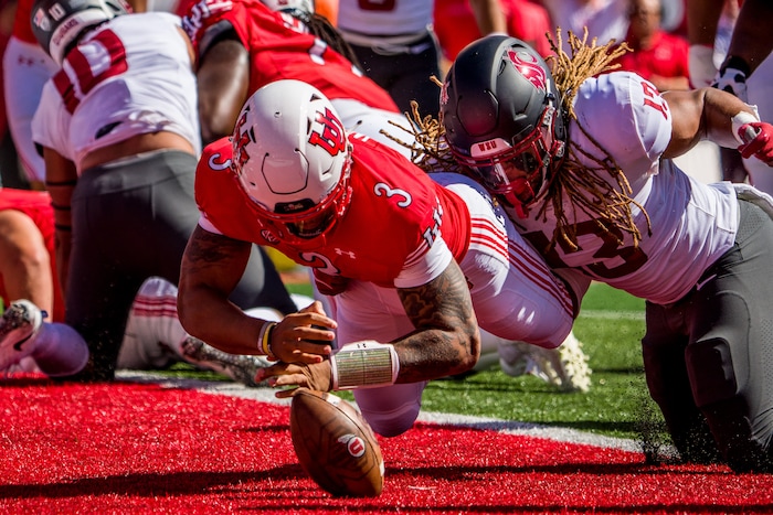 (Trent Nelson  |  The Salt Lake Tribune) Utah Utes quarterback Ja'Quinden Jackson (3) runs for a touchdown as the University of Utah hosts Washington State, NCAA football in Salt Lake City on Saturday, Sept. 25, 2021.