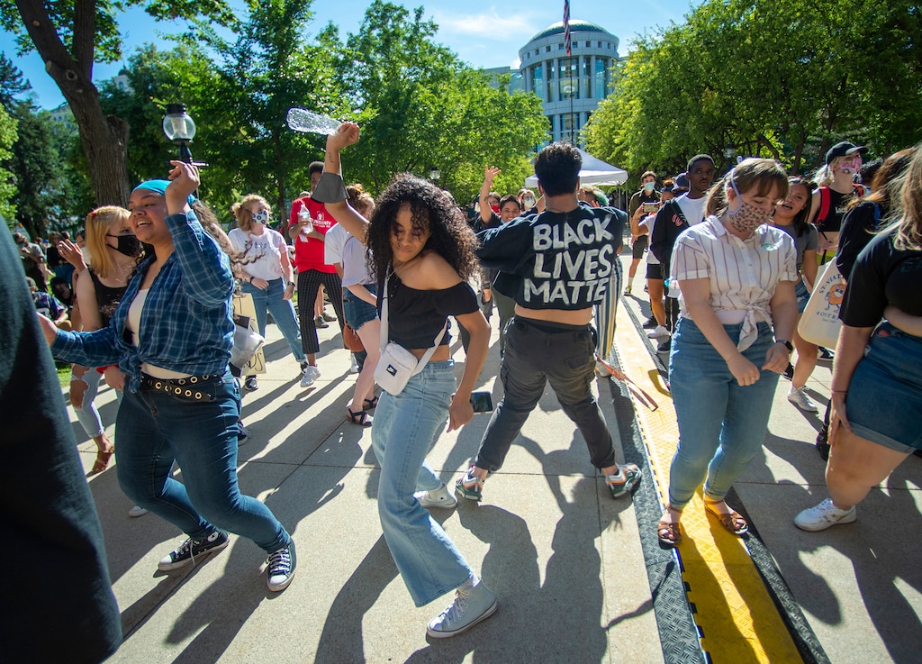 (Rick Egan  |  The Salt Lake Tribune) Revelers dance during the Juneteenth celebration at Washington Square in Salt Lake City on Friday, June 19, 2020. How long Utah's residents are expected to live and how much money they will earn varies depending on their race, ethnicity and sex, according to a new report released Thursday from the Kem C. Gardner Policy Institute.