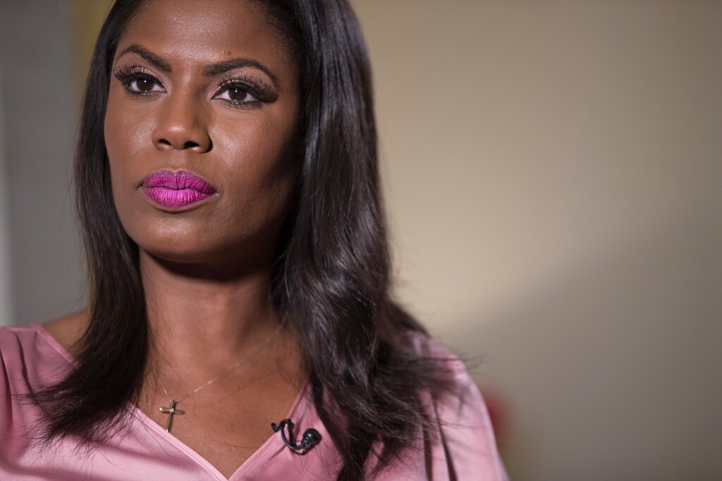 (Mary Altaffer | The Associated Press) Television personality and former White House staffer Omarosa Manigault Newman listens during an interview with The Associated Press, Tuesday, Aug. 14, 2018, in New York.
