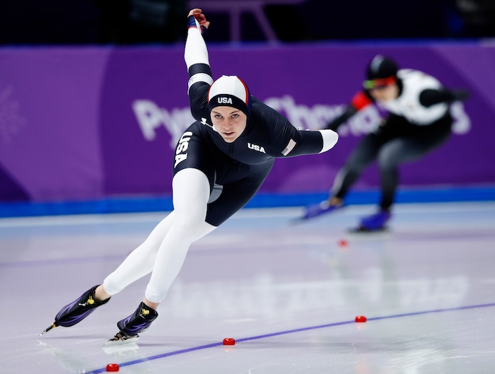 Heather Bergsma of the U.S., left, and Miho Takagi of Japan compete during the women's 1,500 meters speedskating race at the Gangneung Oval at the 2018 Winter Olympics in Gangneung, South Korea, Monday, Feb. 12, 2018. (AP Photo/Vadim Ghirda)