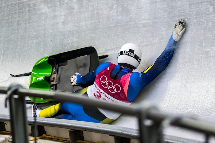 (Chris Detrick  |  The Salt Lake Tribune)  Ukraine's Andriy Mandziy falls off of his sled while competing in the Men's Singles at the Olympic Sliding Centre during the Pyeongchang 2018 Winter Olympics Saturday, February 10, 2018.  Mandziy finished this run in last place with a time of 1:02.935.