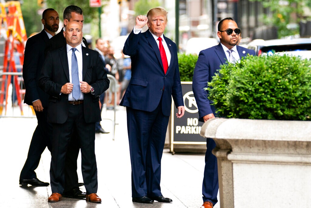 (Julia Nikhinson | AP) Former President Donald Trump gestures as he departs Trump Tower, Wednesday, Aug. 10, 2022, in New York, on his way to the New York attorney general's office for a deposition in a civil investigation.