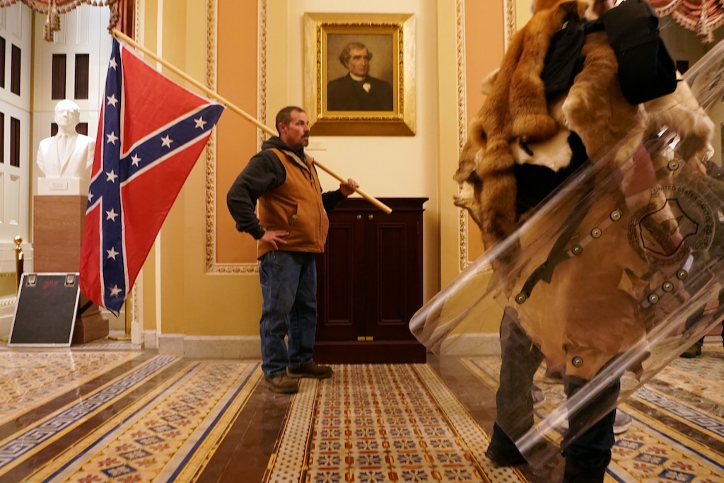 (Erin Schaff | The New York Times) People protesting the presidential election results inside the Capitol in Washington on Wednesday, Jan. 6, 2020. The Capitol building was placed on lockdown, with senators and members of the House locked inside their chambers, as Congress began debating President-elect Joe Biden’s victory. President Trump addressed supporters near the White House before protesters marched to Capitol Hill.