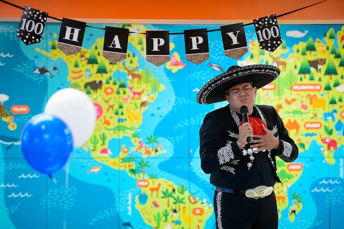 (Trent Nelson | The Salt Lake Tribune)  Singer Jorge Luis Galez performs at Chapman Branch Library Centennial Day, a celebration of the Chapman Branch Library's 100th birthday, in Salt Lake City, Saturday June 2, 2018.