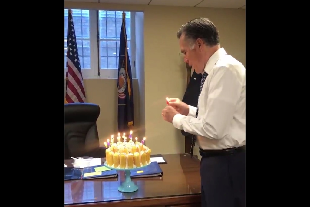 (Photo courtesy of Mitt Romney's Twitter account) Sen. Mitt Romney blows out an individual candle from a birthday cake made out of Twinkies in a video that was posted on Mar. 12, 2019.