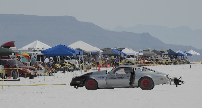 (Francisco Kjolseth  |  The Salt Lake Tribune)  A car heads back to the pit during Speed Week at the Bonneville Salt Flats outside Wendover, Utah on Monday, Aug. 14, 2017.